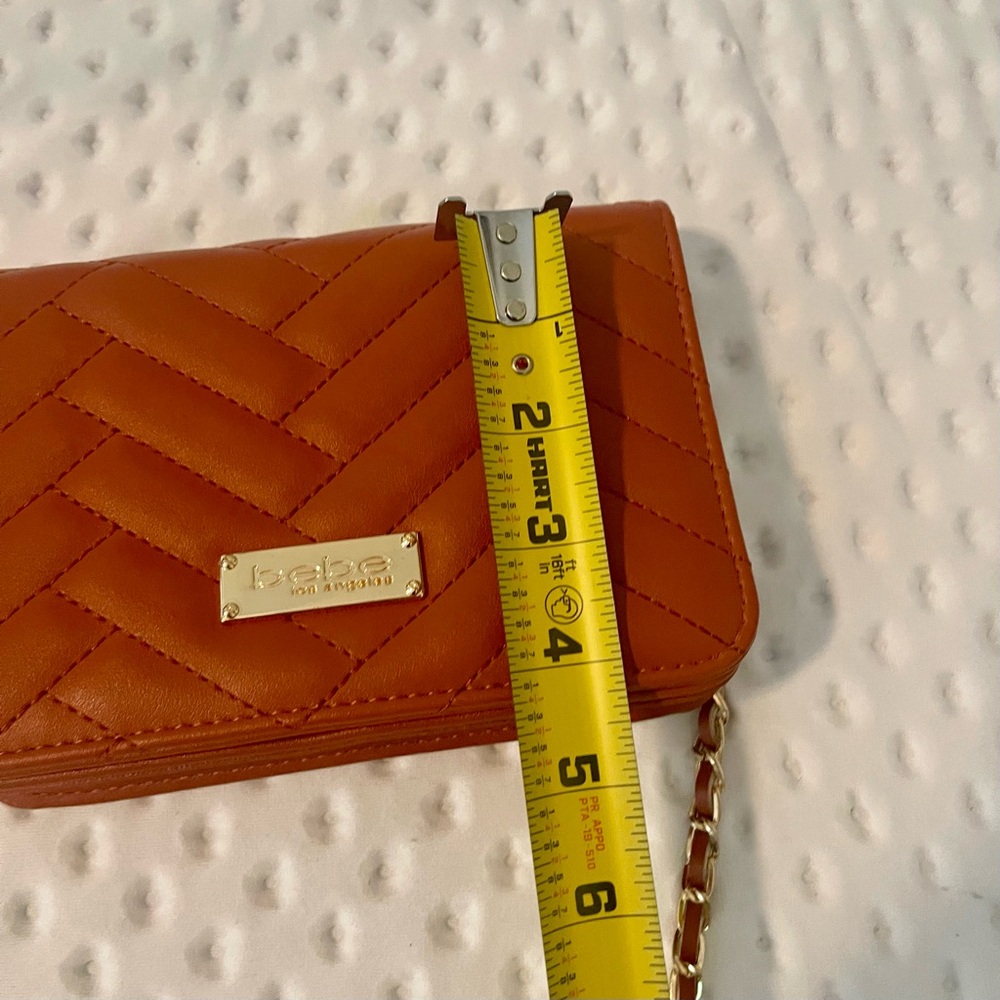 Elegant BEBE Sophia
Crossbody Bag Warm Blush
New condition - Picture 10 of 10